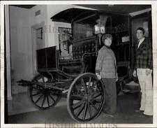 Press Photo Lady and gentleman pictured with antique stagecoach - saa97331 picture