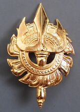 Vintage Laos Army cap badge in the past picture