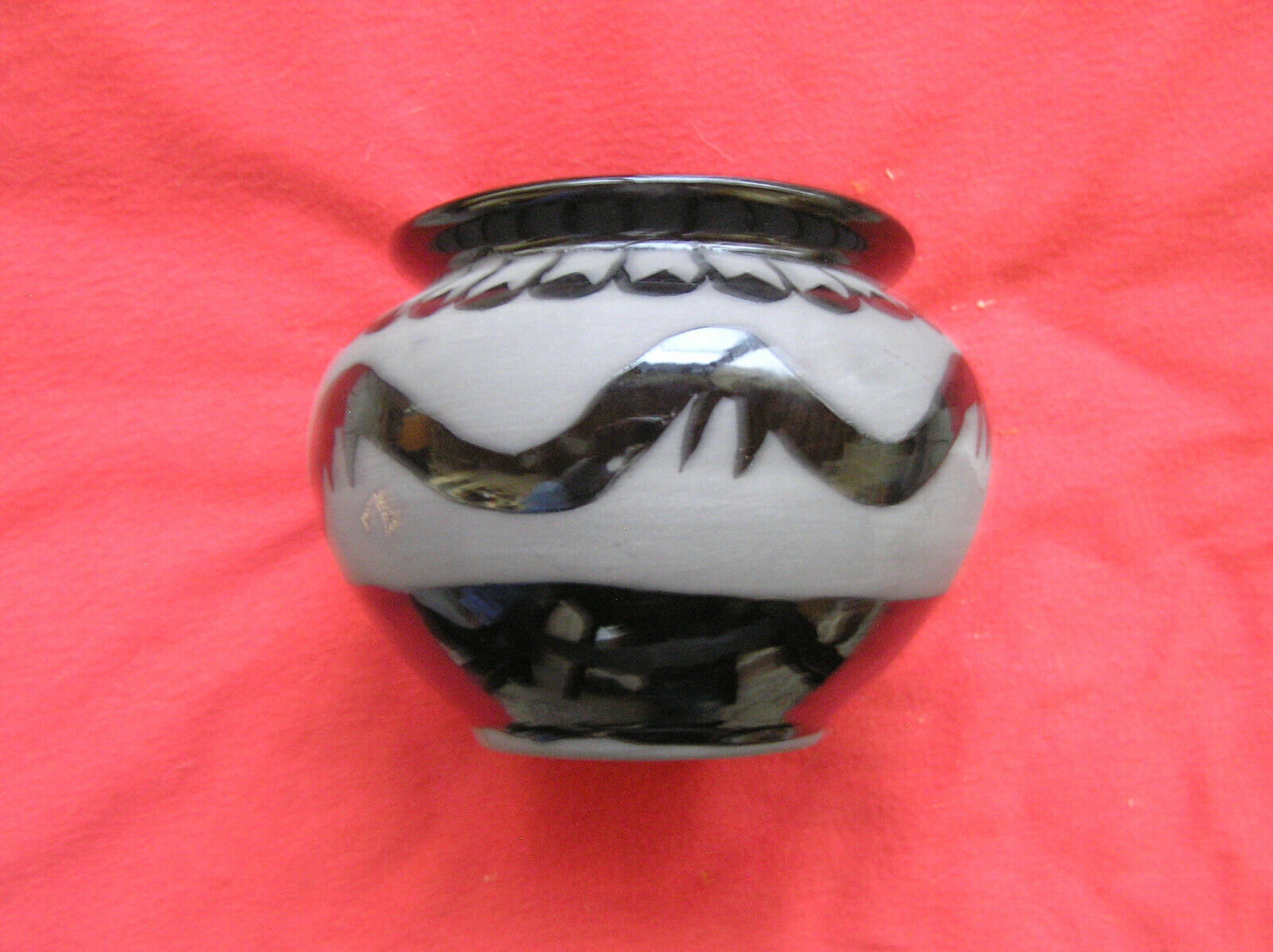 834. Native Am. black smoked/polished bowl depicting snake/serpent,signed/dated