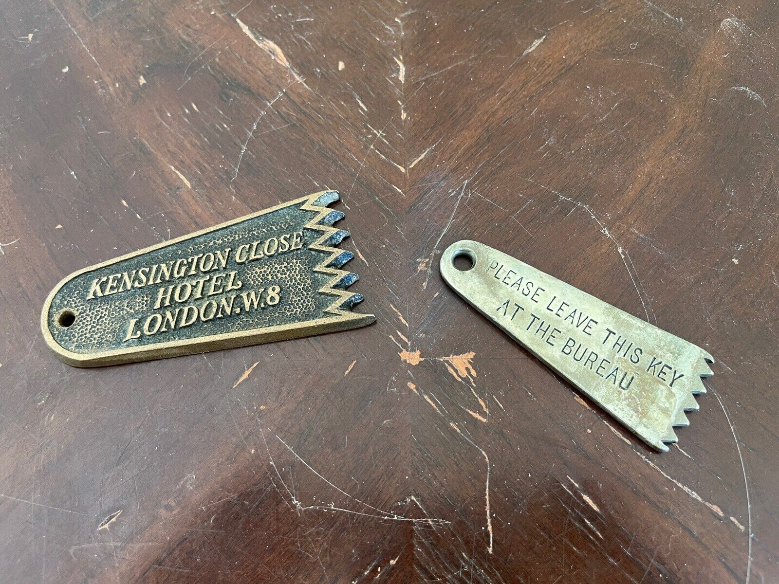 Pair Of Antique Flag Shaped Hotel Key Fobs