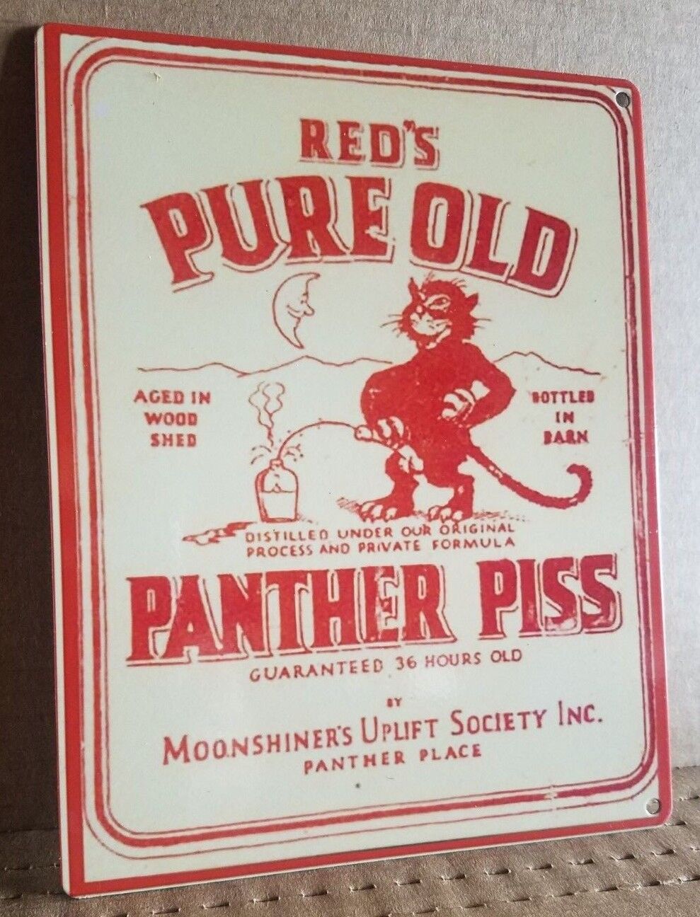 Reds pure old panther piss moonshine label ad reproduction steel sign bar decor