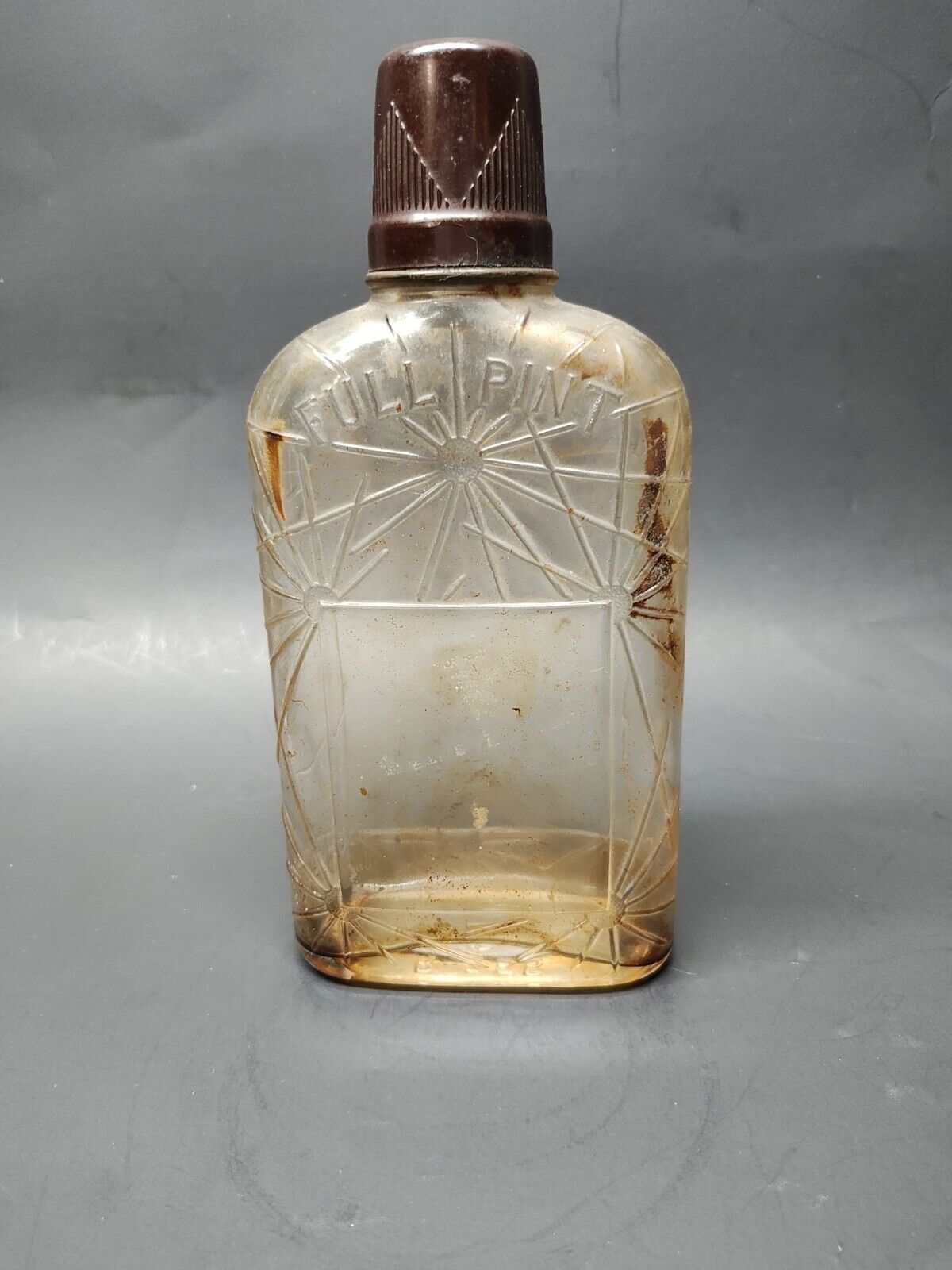 Antique WHISKEY SPIRITUS  SPIDER web embossed pint clear glass bottle