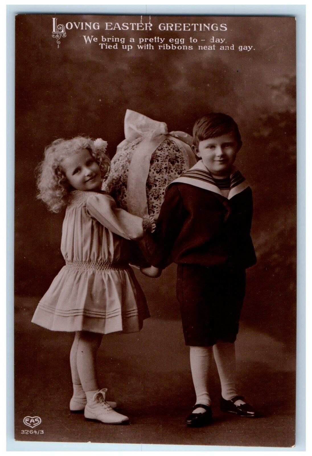 c1910's Easter Greetings Children Carrying Pretty Egg EAS RPPC Photo Postcard