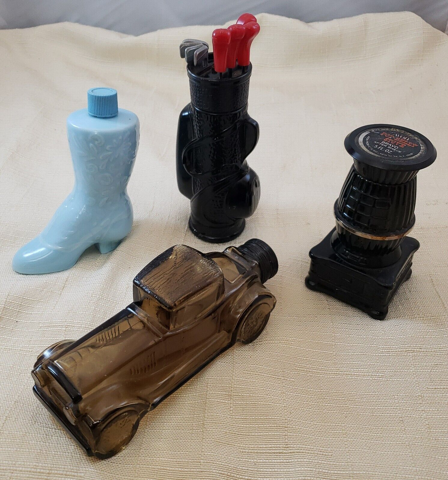 Lot of Empty Avon Cologne/Aftershave Bottles Shoe Car Golf Clubs Pot-Belly Stove