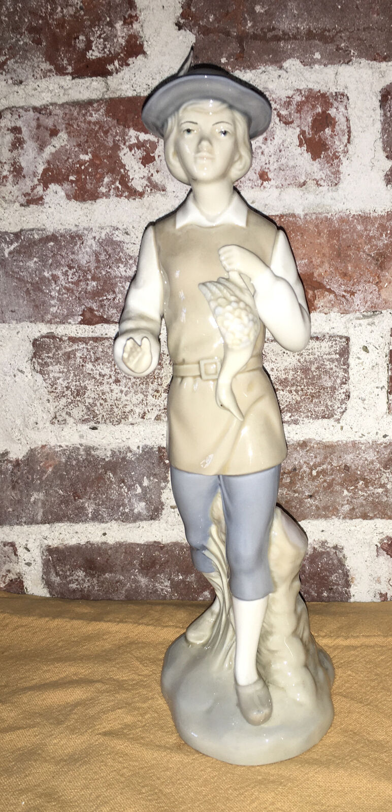 Retired  Large Lladro Figurine Collectibles of Man Holding Bird 12 1/2\