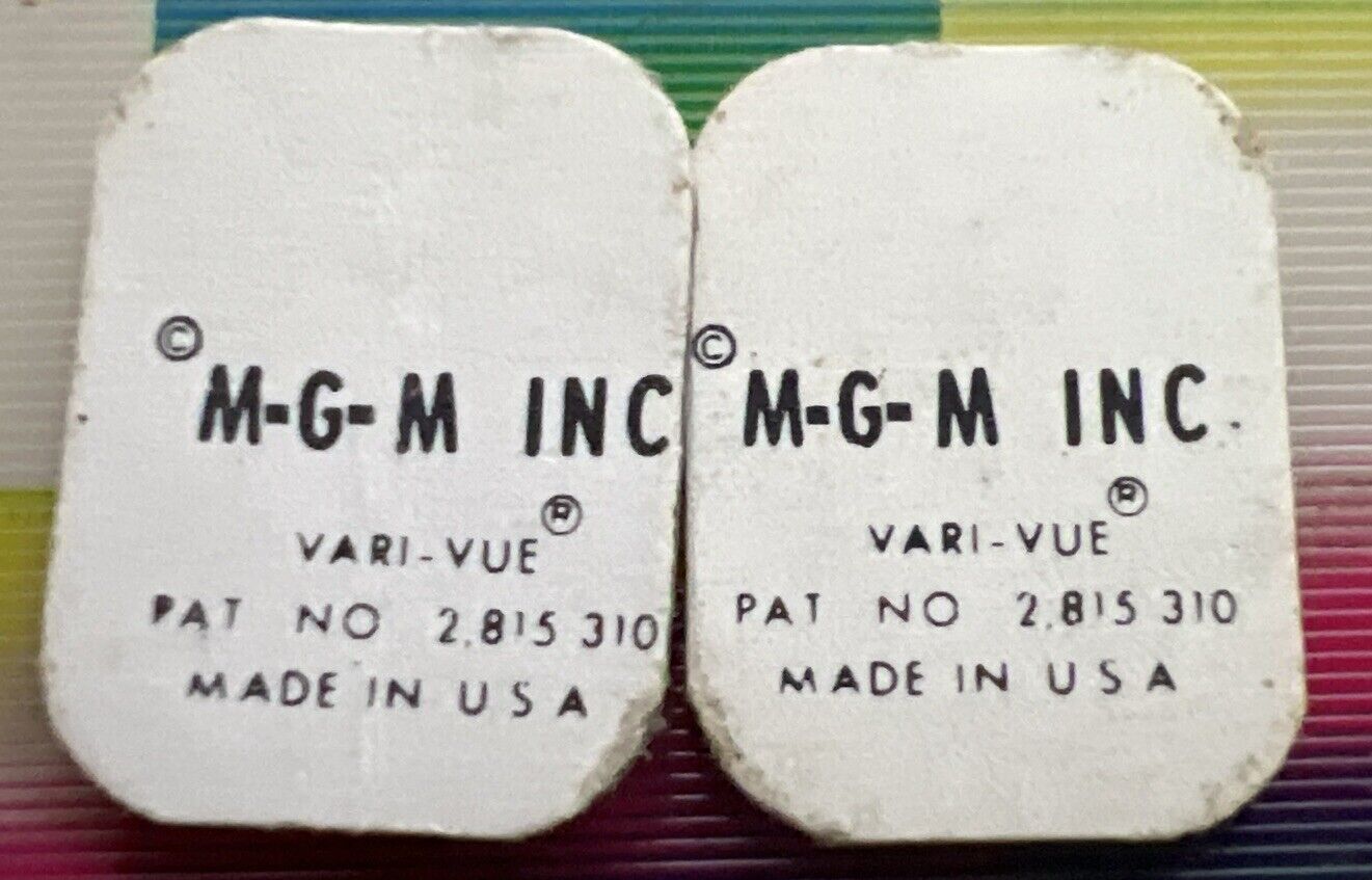 2 Different  1960’s Vari-Vue Man From Uncle Flicker Flasher Ring inserts NOS