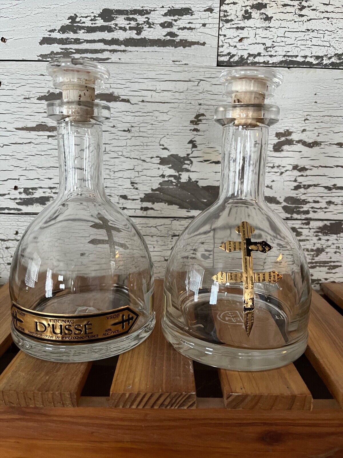Lot of Two (2) D'USSE 750ML VSOP Cognac Bottles/Corks. Empty of any alcohol.