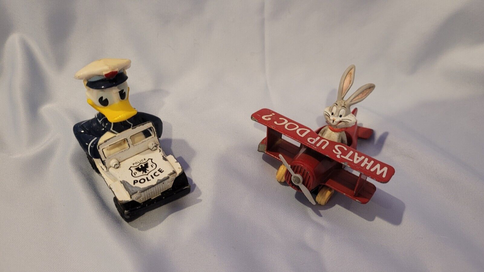 Vtg \'79 Matchbox Donald Duck Policeman & \'88 Ertl Bugs Bunny Airplane Diecast 