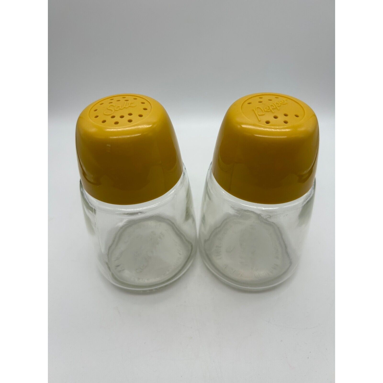 Vintage Federal Housewares Glass Salt and Pepper Shakers Yellow Lid