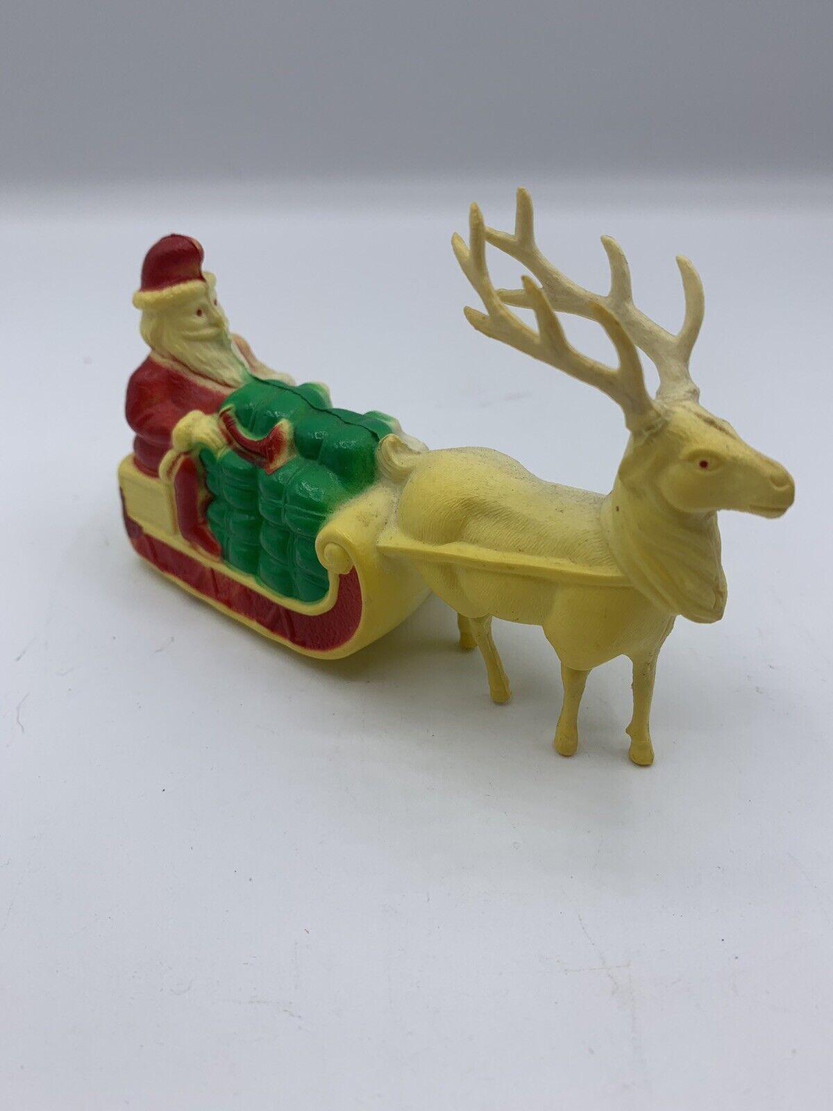VINTAGE 1950s IRWIN CELLULOID SANTA ON SLED w/ GIFTS