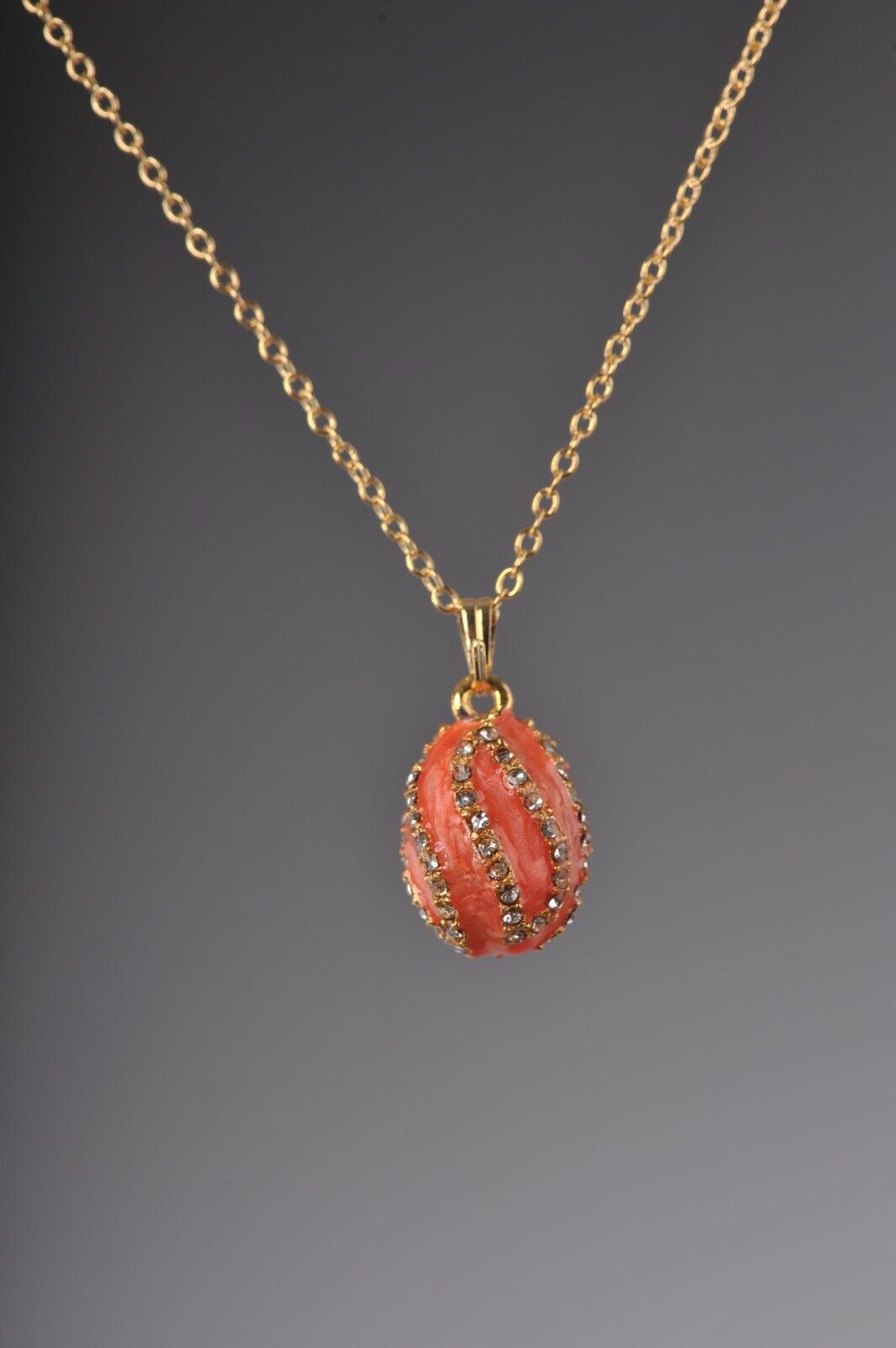 Salmon Spiral Egg Pendant Necklace with crystals by Keren Kopal
