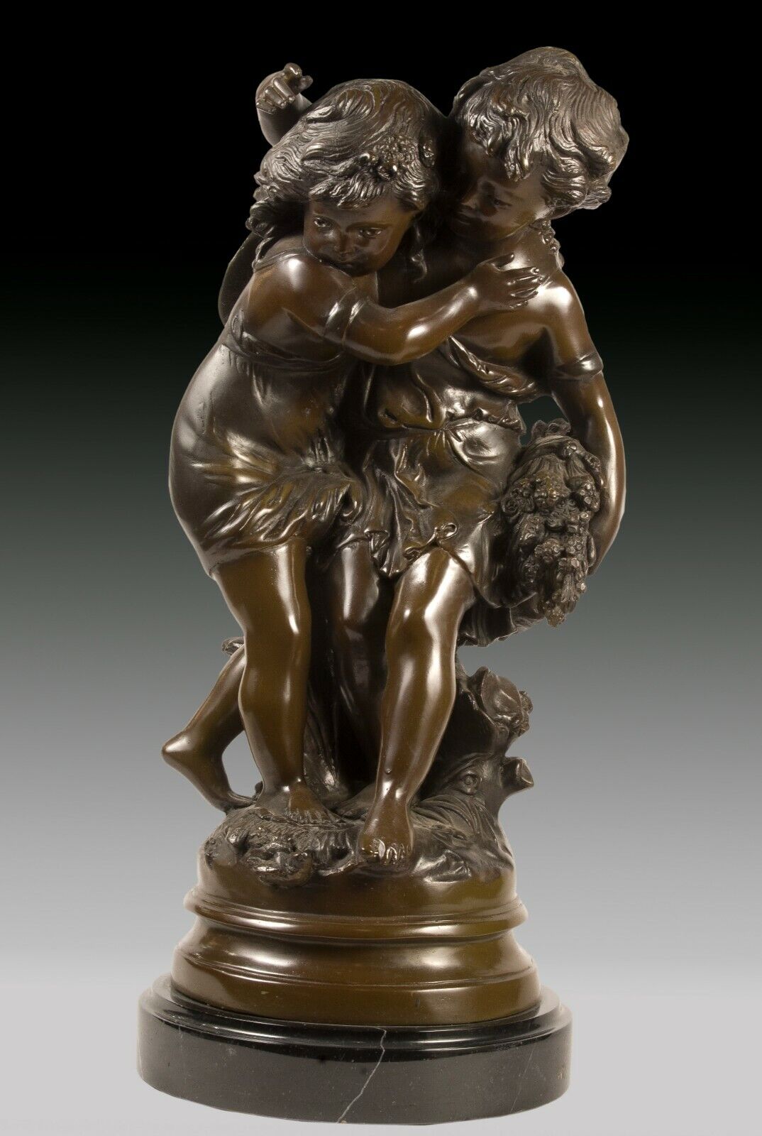 Boy and girl. Bronze. After models from Auguste Moreau (1834-1917).