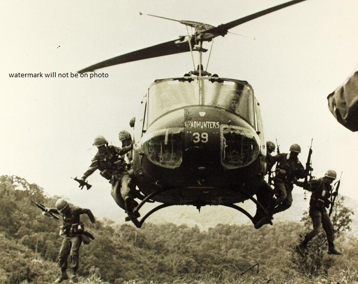 Bell UH-1 Huey Helicopter dropping off troops 8\