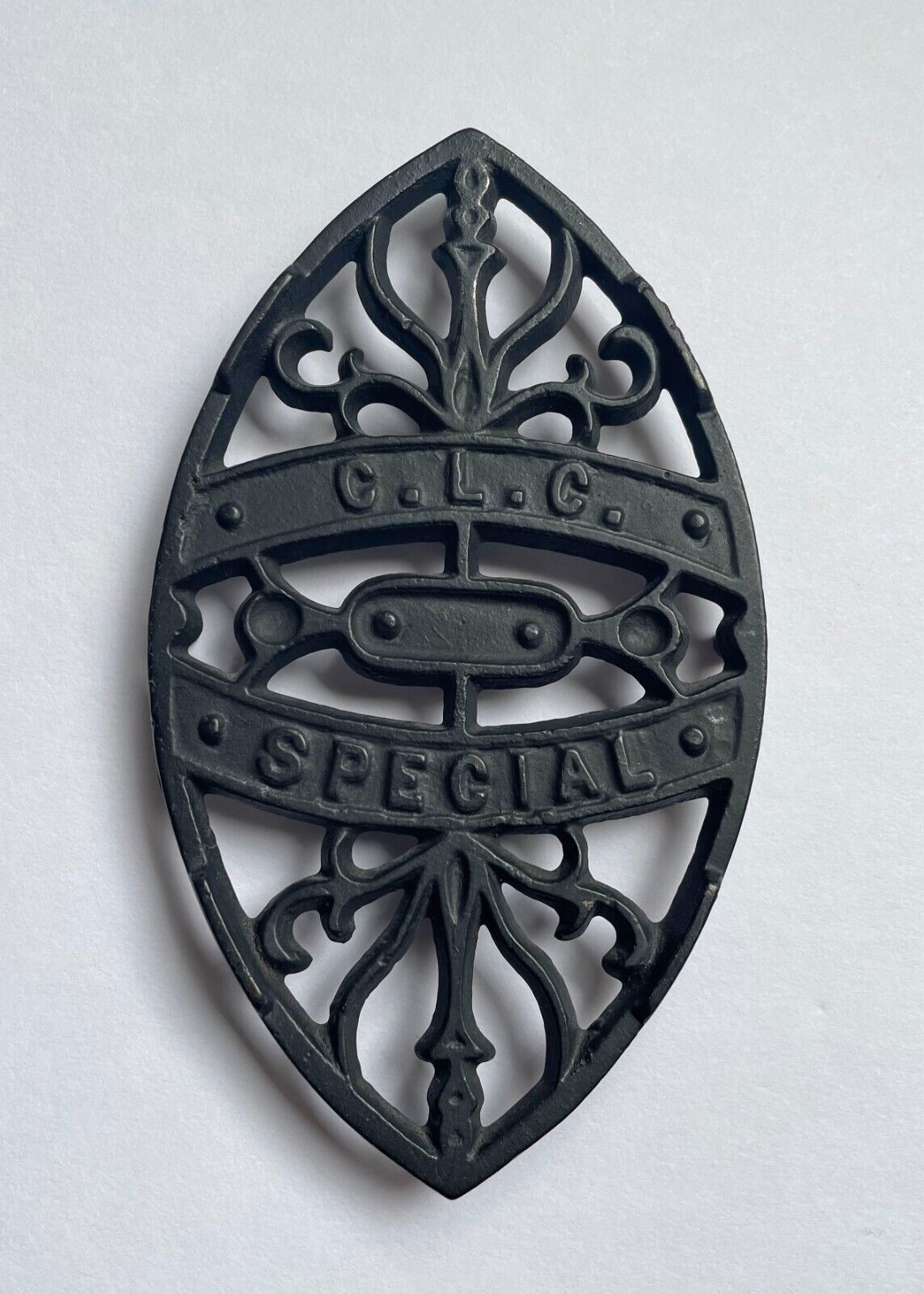 Vintage C.L.C. SPECIAL Footed CAST IRON TRIVET Stand Sad Iron