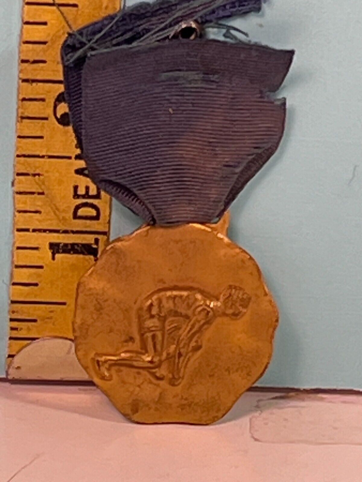Antique Running  with ribbon Medal pinback