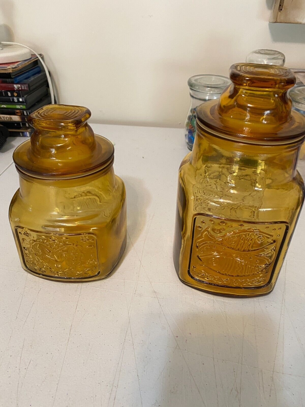 A Pair Of vintage Wheaton , NJ  Honey Amber Glass Jar with Lid fish And Heart