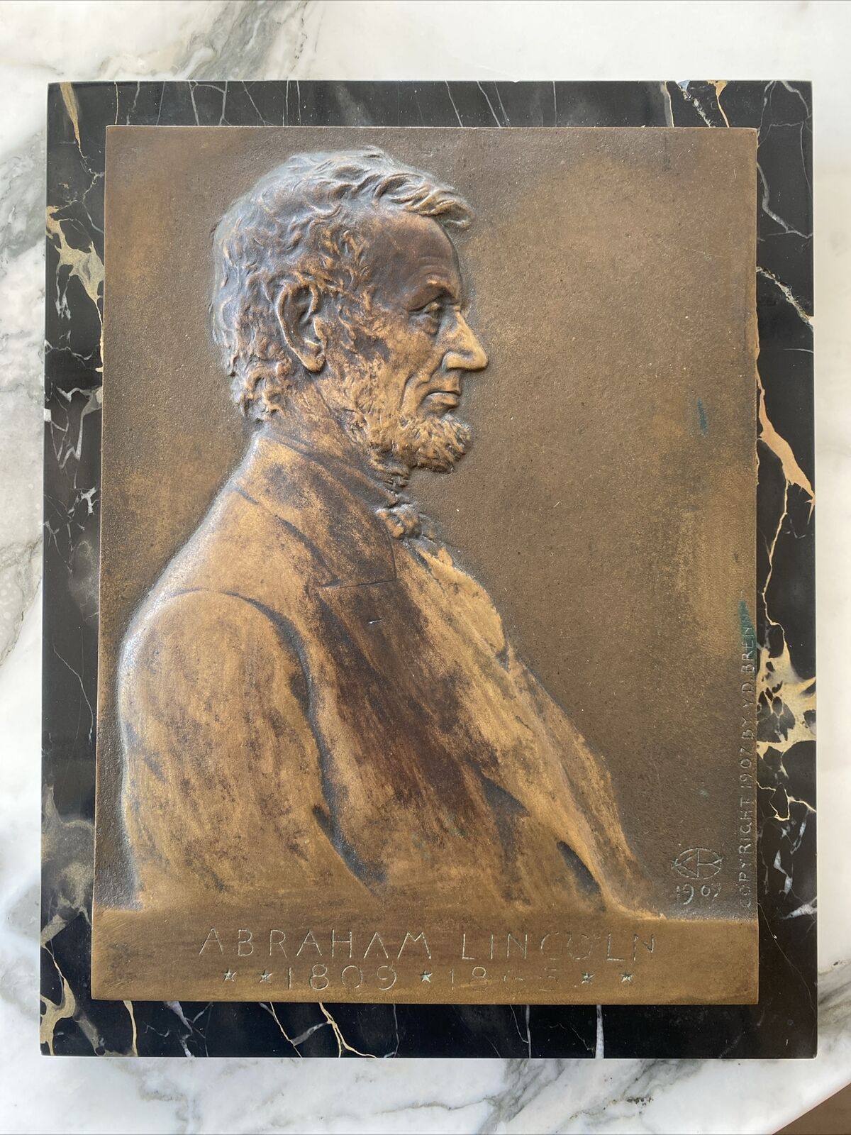 Victor David Brenner Abraham Lincoln Bronze plaque; marble slab, original stand