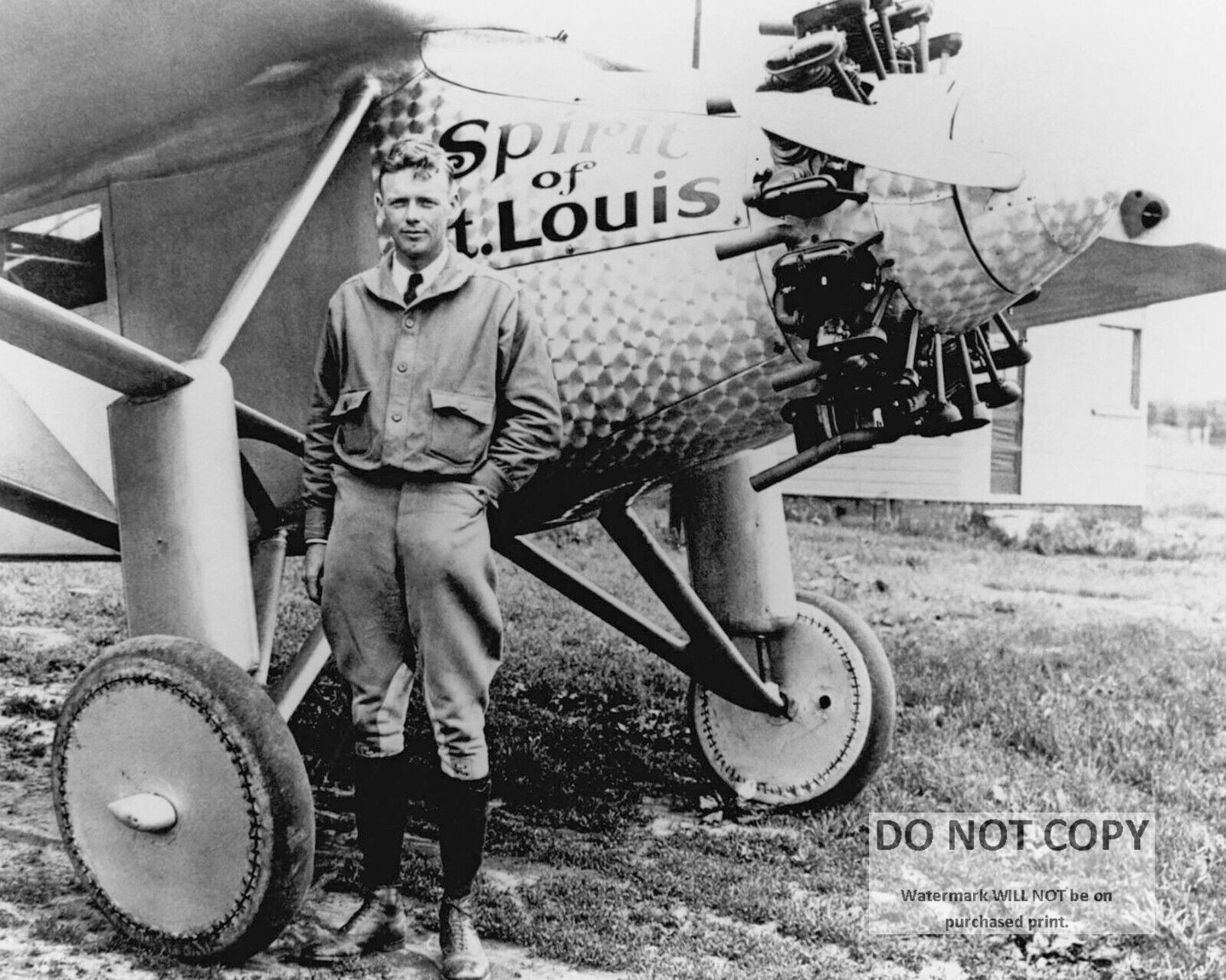 CHARLES LINDBERGH IN FRONT OF PLANE 