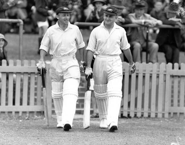 Australian cricketers Sir Don Bradman , and Stan McCabe going out - 1930s Photo