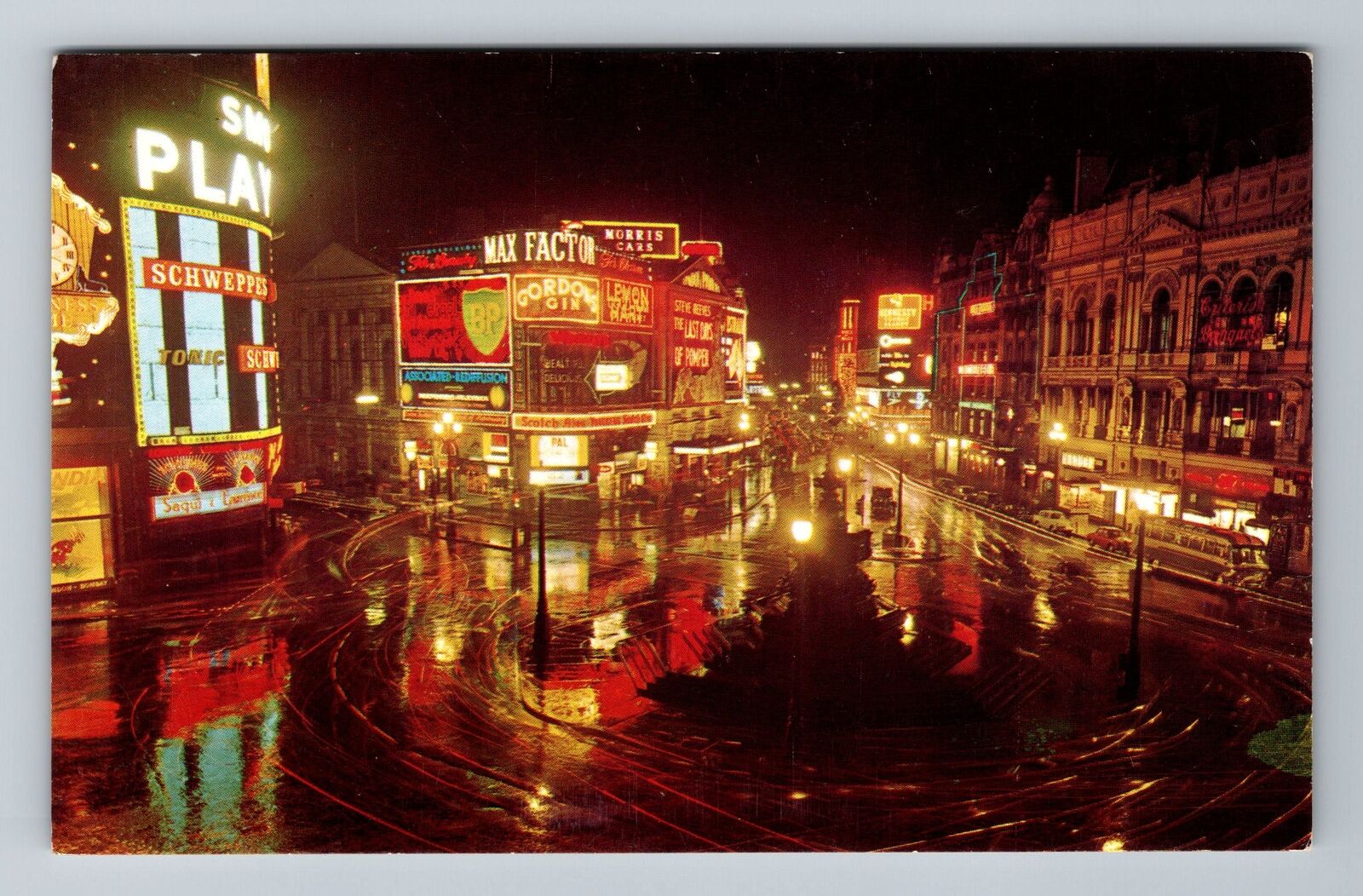 London England, Piccadilly At Night Vintage Souvenir Postcard