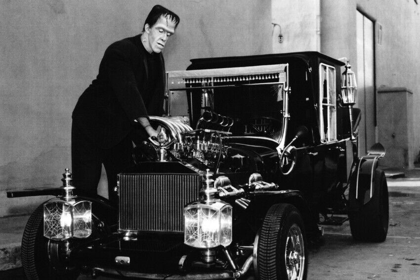 FRED GWYNNE TUNING UP THE MUNSTER CAR IN THE MUNSTERS 24x36 inch Poster