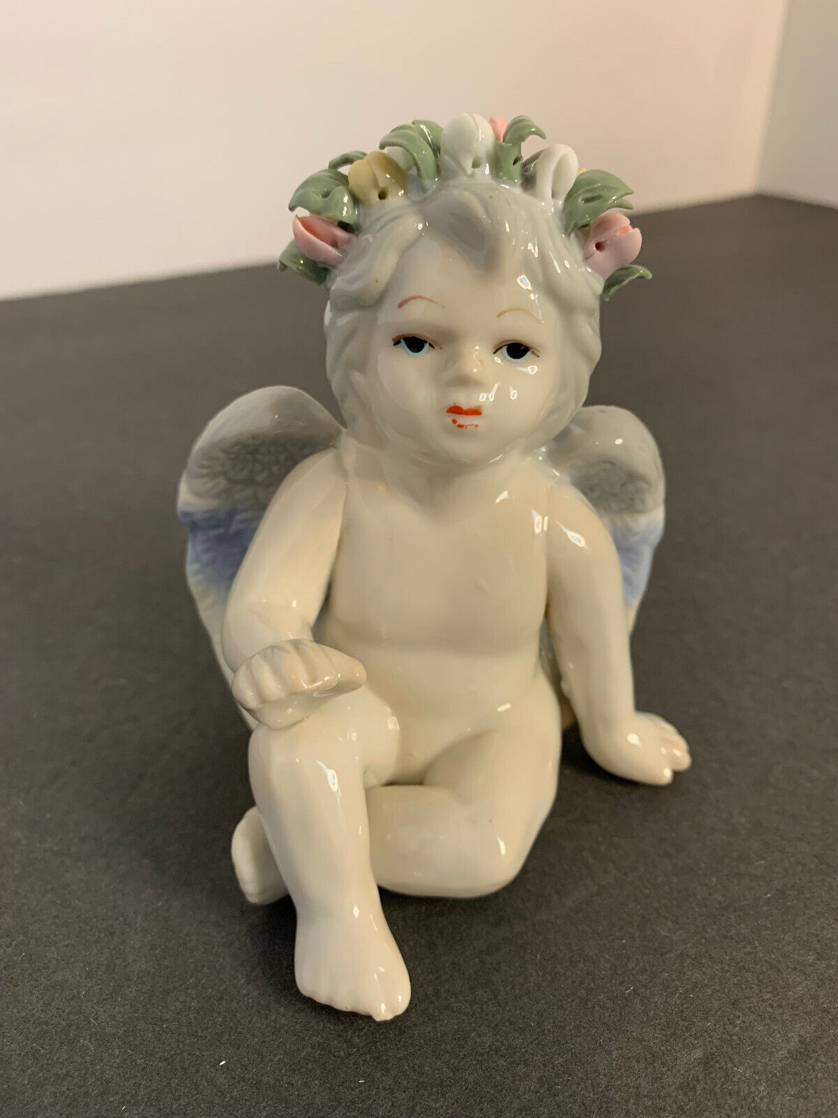 Ceramic Sitting White Angel Figurine With Flower Halo