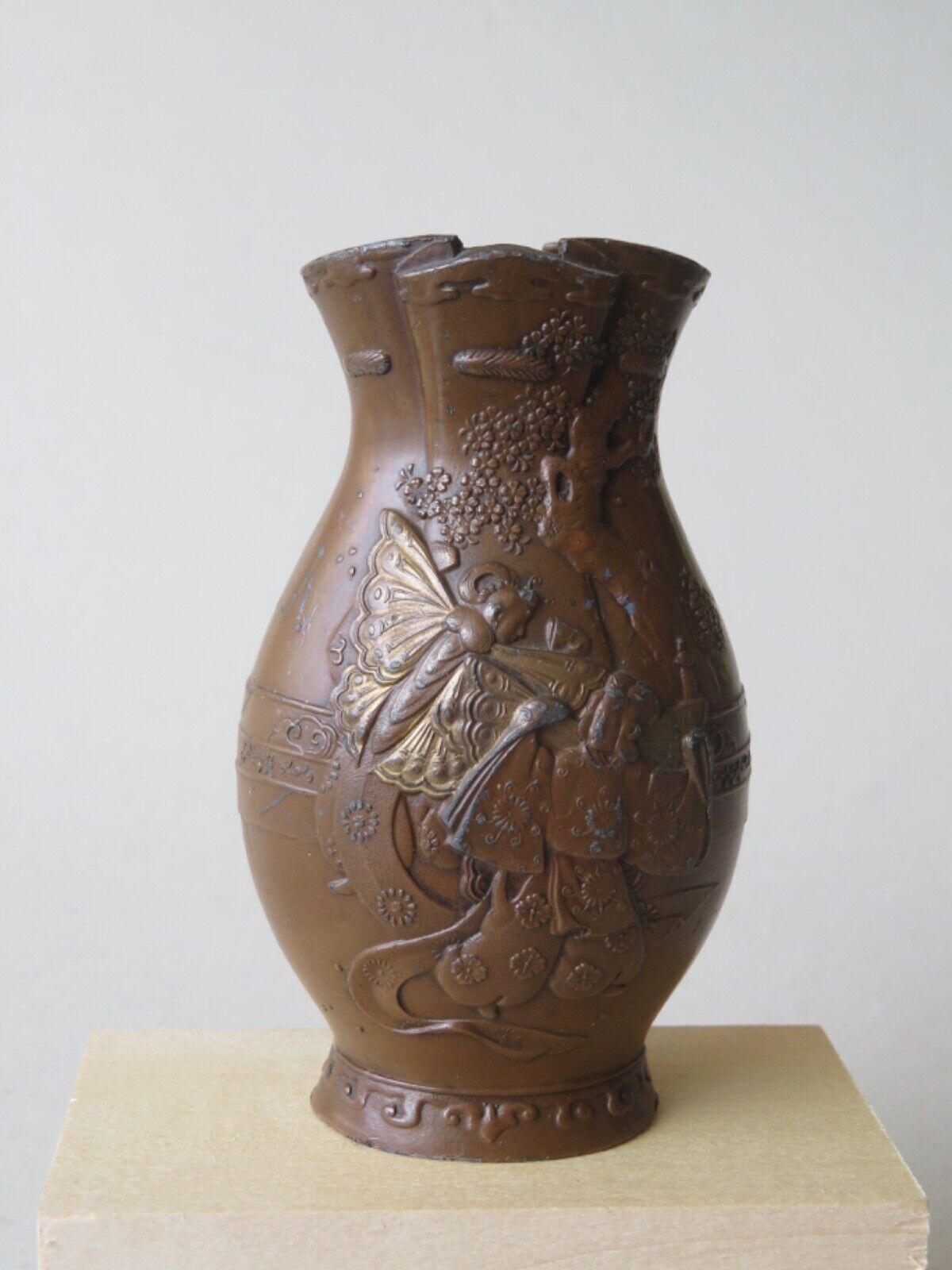 OLD JAPANESE METAL VASE WITH EMBOSSED FIGUES IN A FANTASY SETTING