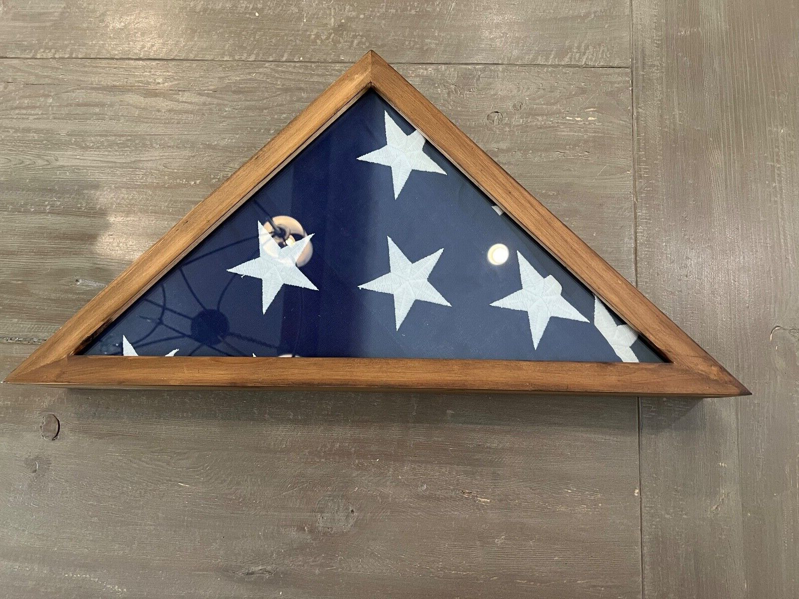 American veteran flag 5\' x 9.5\' AND WALNUT FINISH CASE.