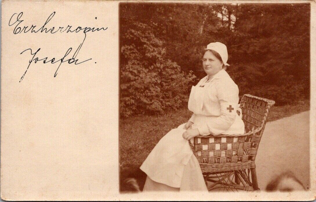 Real Photo Postcard Red Cross Nurse Sitting in Wicker Chair