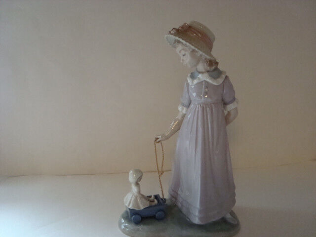 Lladro Little Girl pulling doll in wagon  #5044 Glossy Figurine - Retired