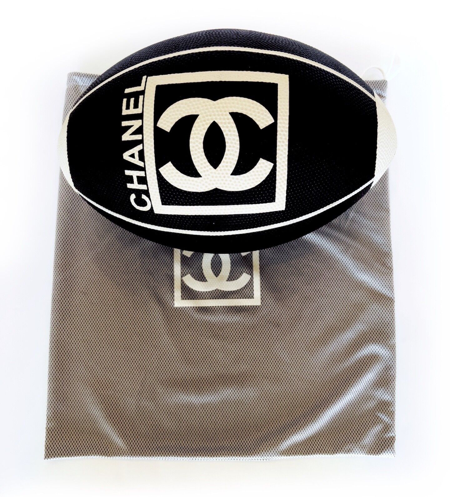 Authentic Chanel rugby ball, circa 2007, in mint condition with bag