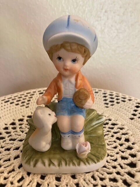 Vintage Porcelain Homco Figurine of a Boy holding a ball and petting his dog