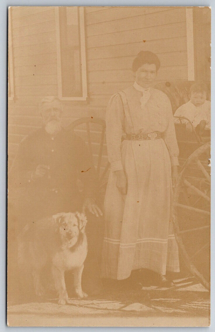 Family Photo and Dog Outside their Home c1900\'s RPPC Real Photo Postcard VTG