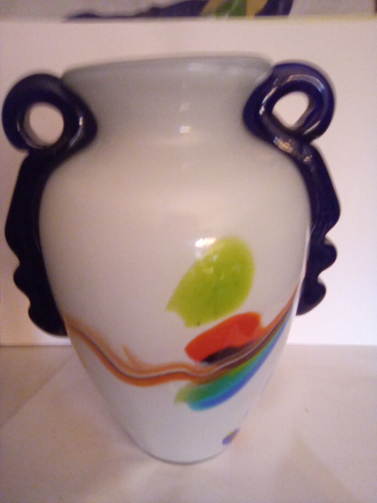 7in White W/Abstract Colors Vase &Colbolt Blue Hands. Eyxcellent condition.  #88