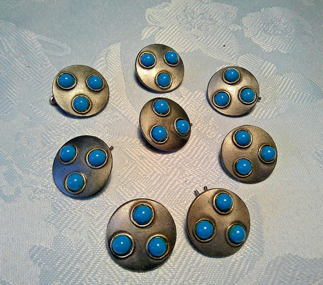unique silver tone buttons (8) each with 3 turquoiseblue colored beads