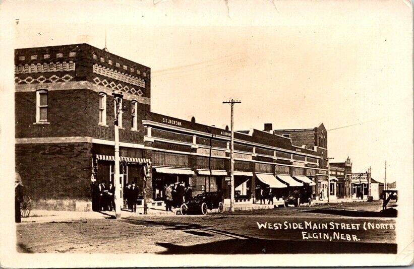 RPPC Postcard People Gathered Corner West Side Main Street Elgin NE 1915   20535