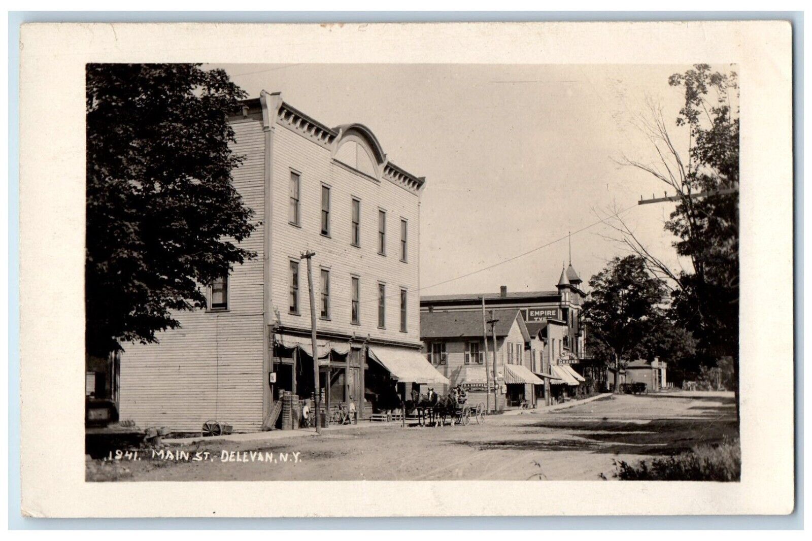 1911 Main Street Stores Empire Delavan Cattaraugus NY RPPC Photo Posted Postcard