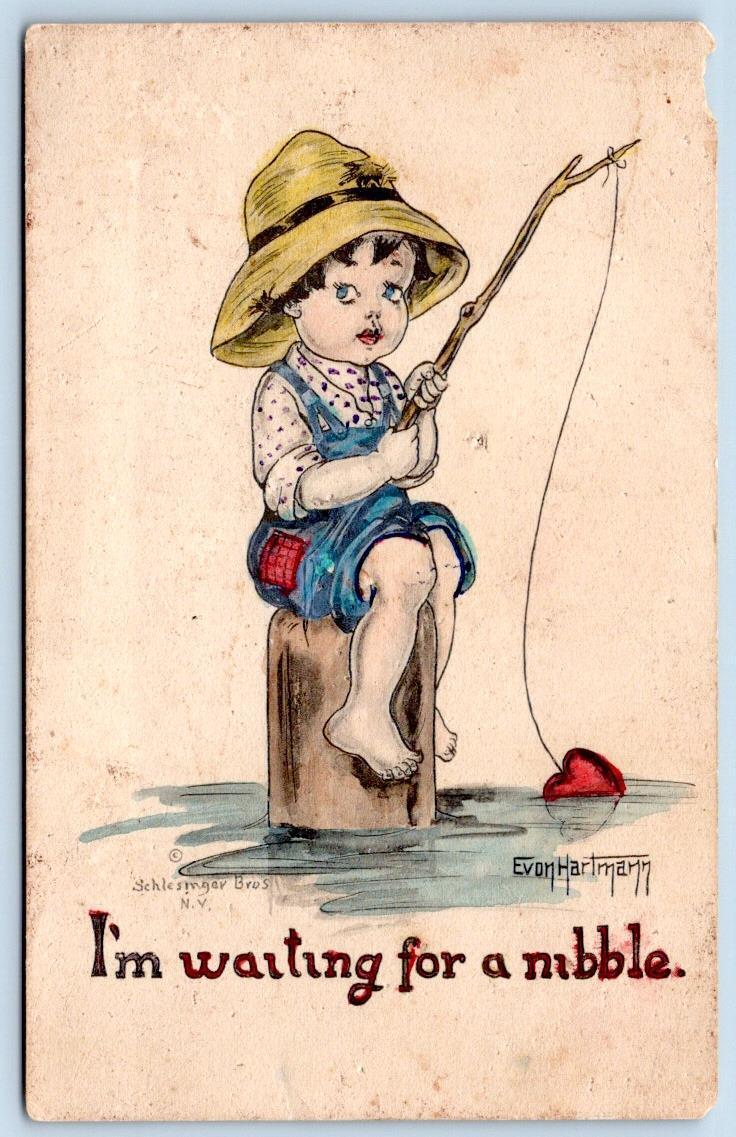 1910\'s FISHING BOY WAITING FOR A NIBBLE ARTIST E HARTMANN SCHLESINGER POSTCARD