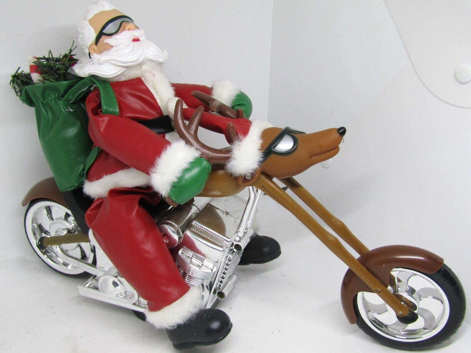 Santa on Reindeer Chopper, Plays Born to be Wild, Christmas Version.
