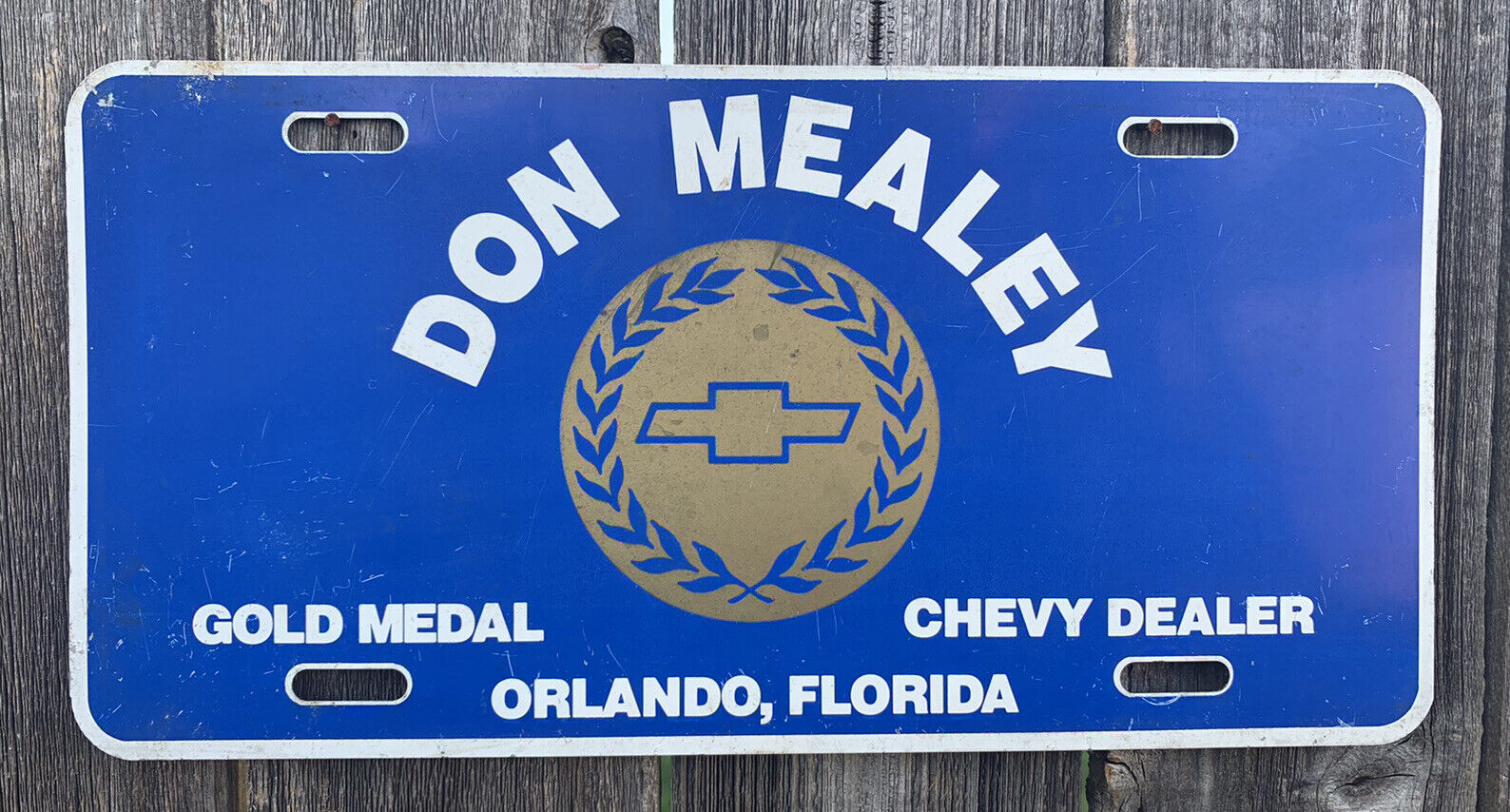 DON MEALEY DEALERSHIP LICENSE PLATE ORLANDO FLORIDA CHEVY CHEVROLET GOLD MEDAL