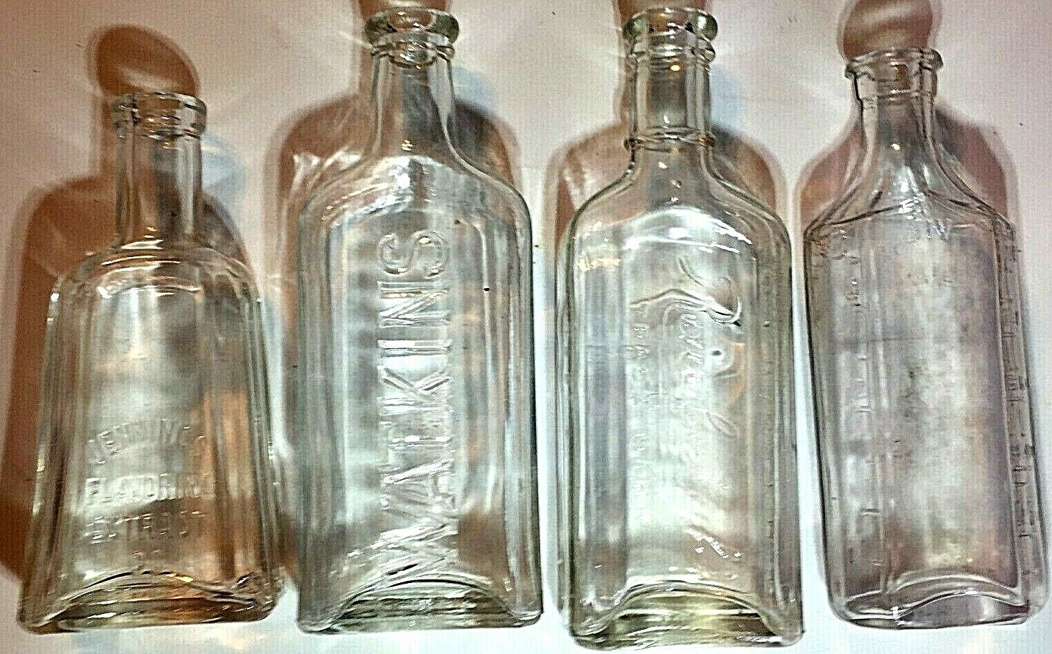 Lot of 4 Vintage Glass  Bottles - 3 tonics Rawleighs -Watkins 1-Extract 