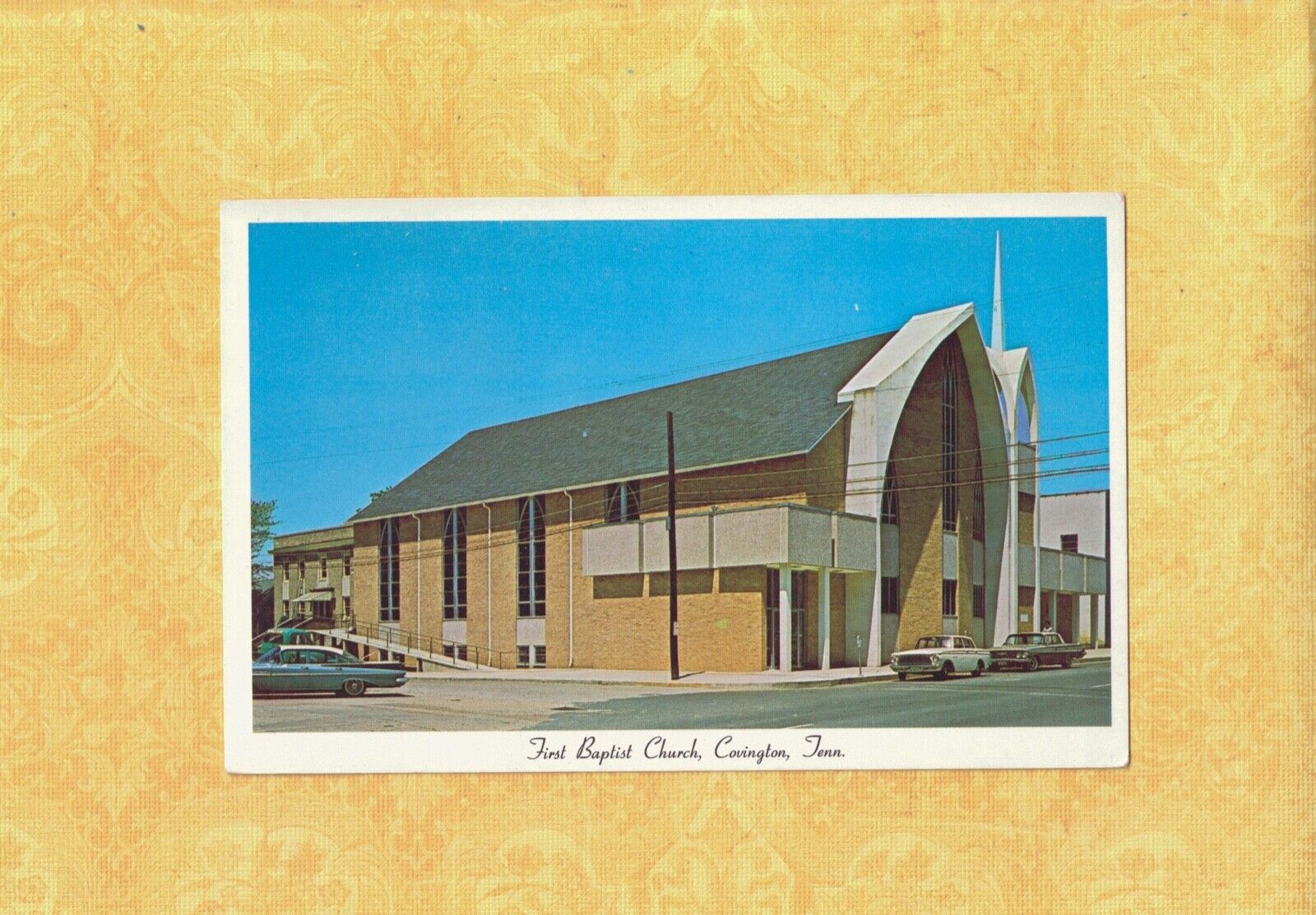 TN Covington 1960s era postcard BAPTIST CHURCH & vintage automobiles Tenn