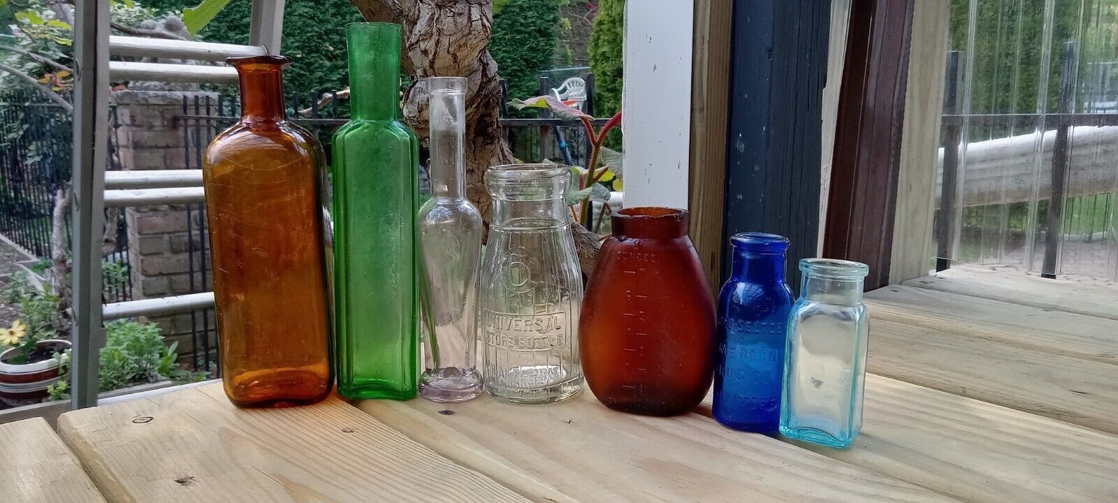 Lot of 7 Antique Small Embossed / Unembossed Bottles