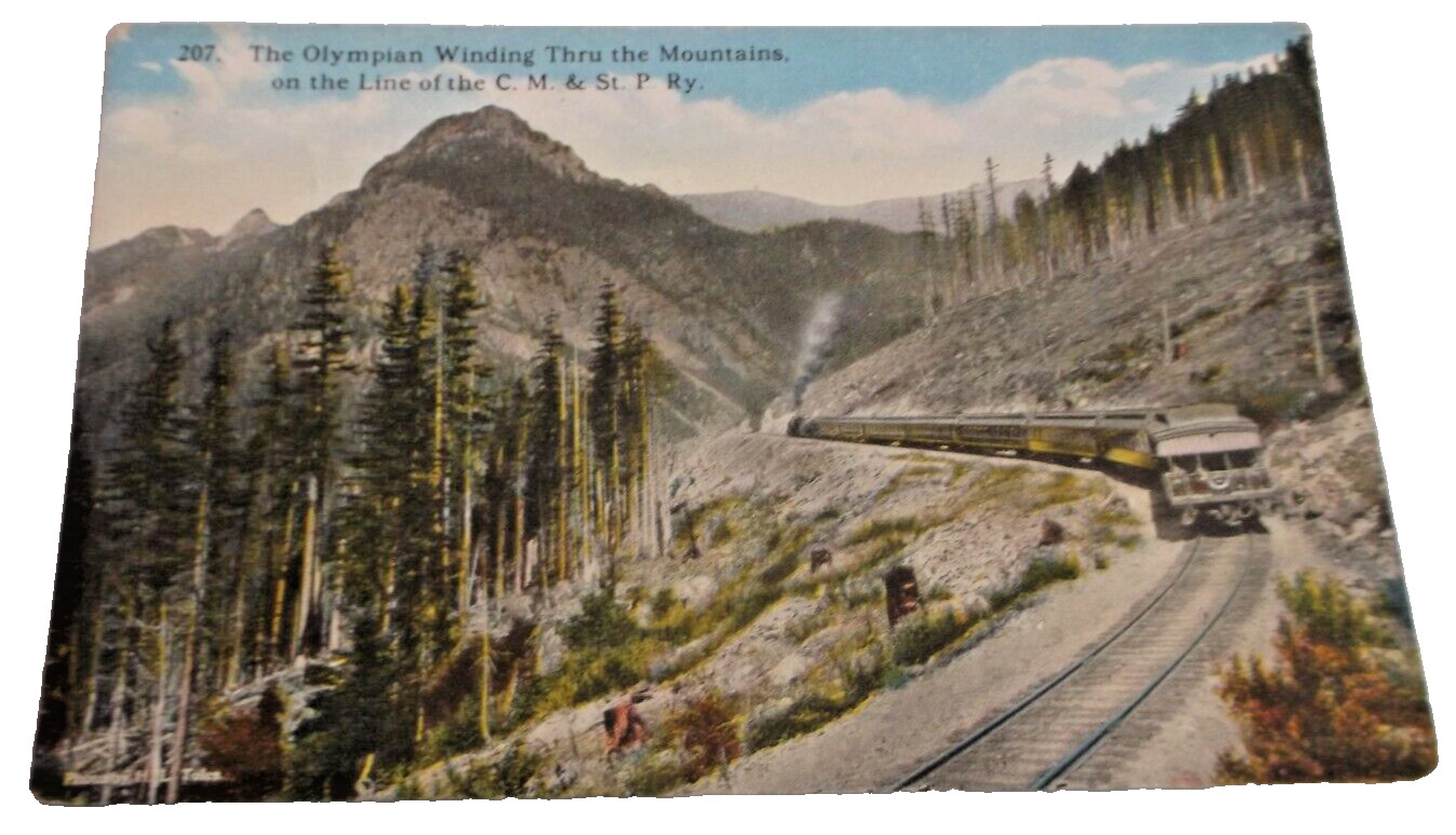 1920 MILWAUKEE ROAD OLYMPIAN IN THE MOUNTAINS USED POST CARD