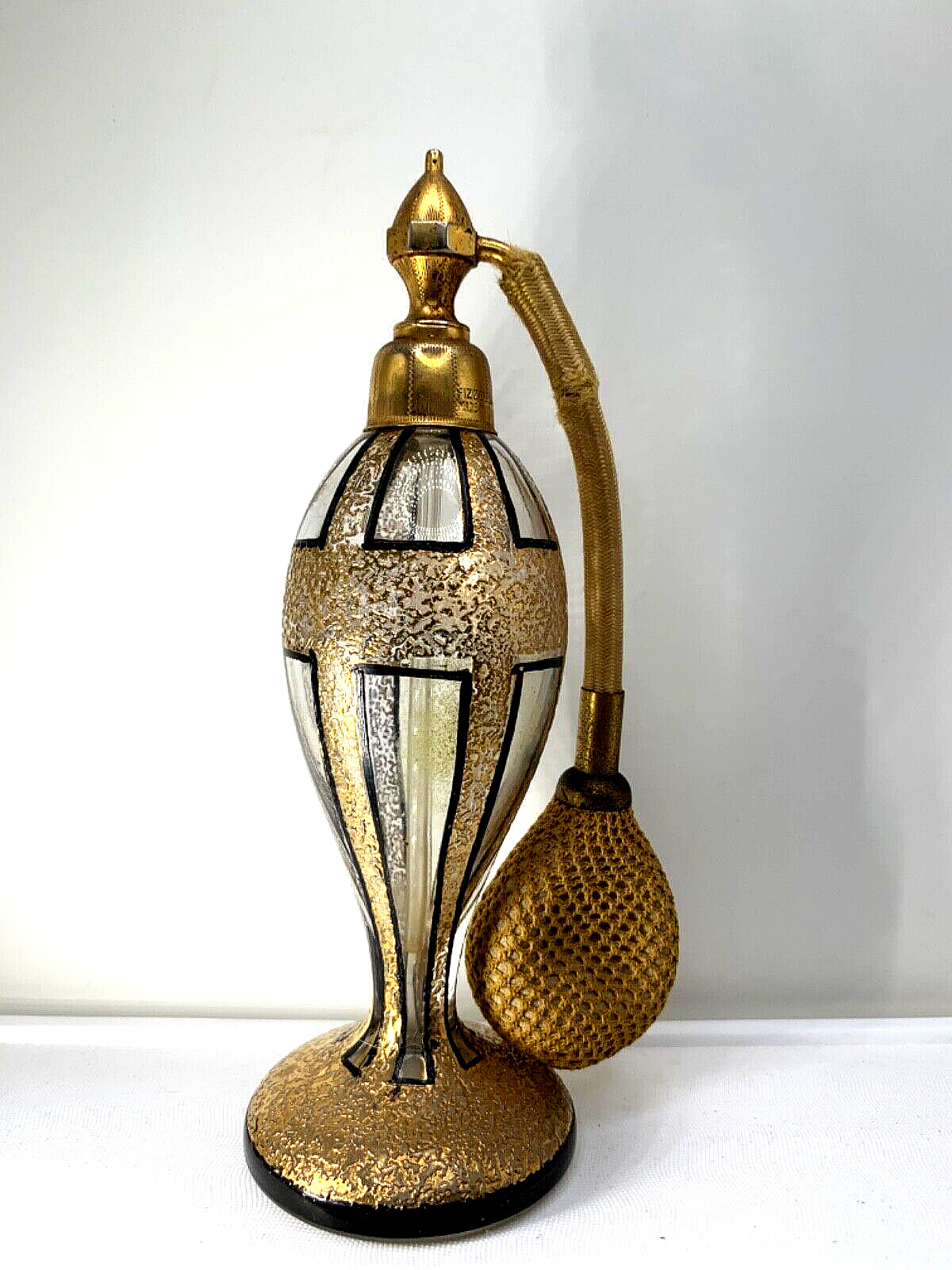 DeVilbiss windowpane gilded perfume bottle w/Marcel Franck fizz atomizer mount.