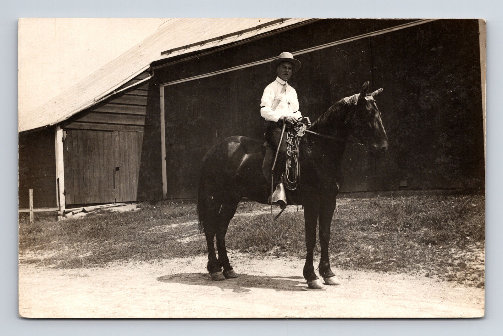 RPPC Young Man on Nice Looking Horse Huge Barn Real Photo Postcard