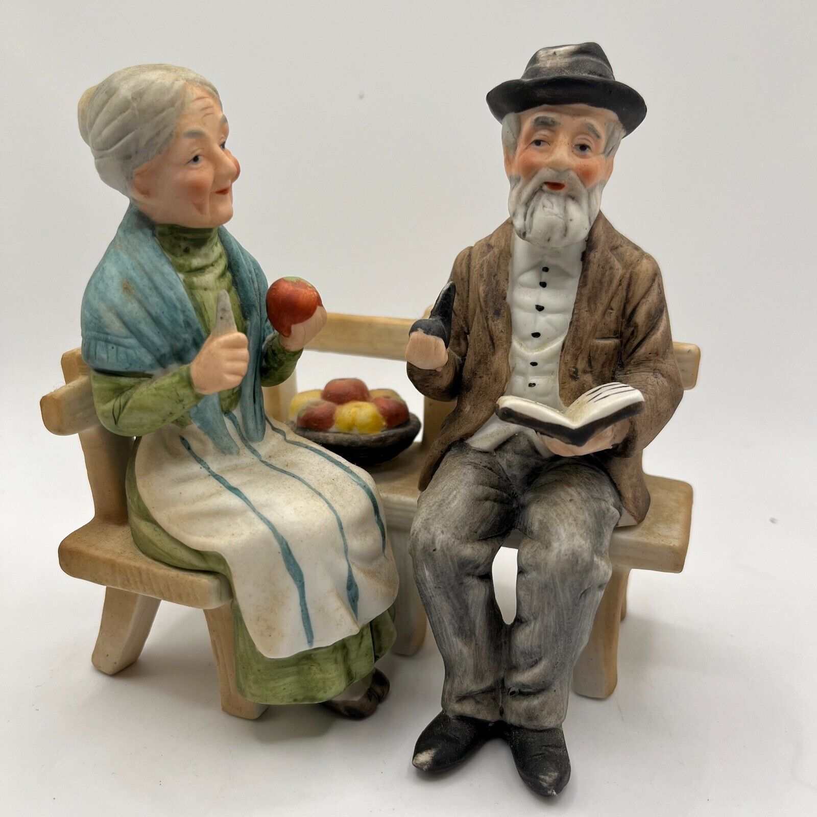 Lefton Porcelain Figurine of Old Elderly Couple Sit on Bench Apple Man Woman VTG