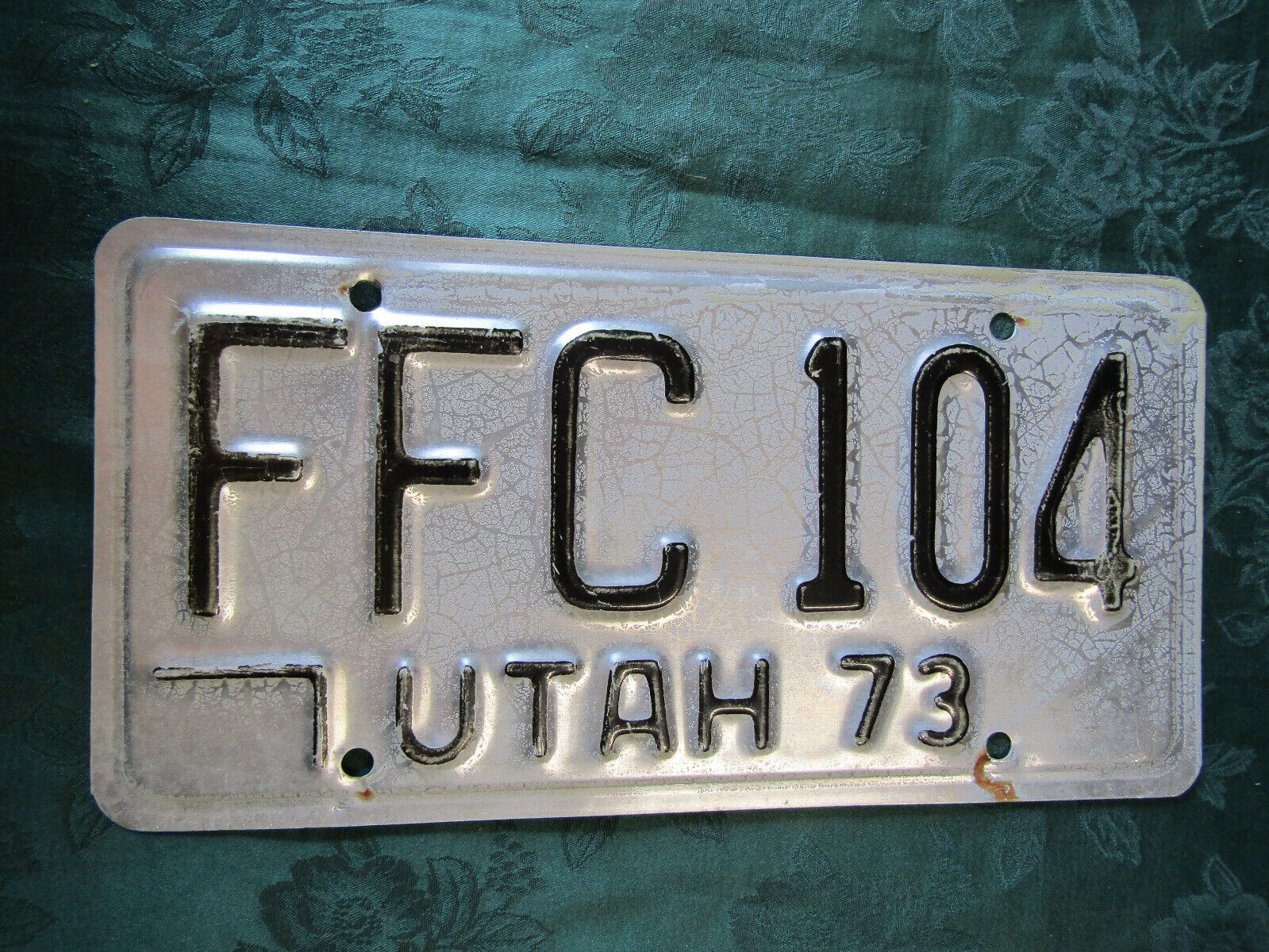 1973 Utah License Plate FFC 104, Baked by Sun