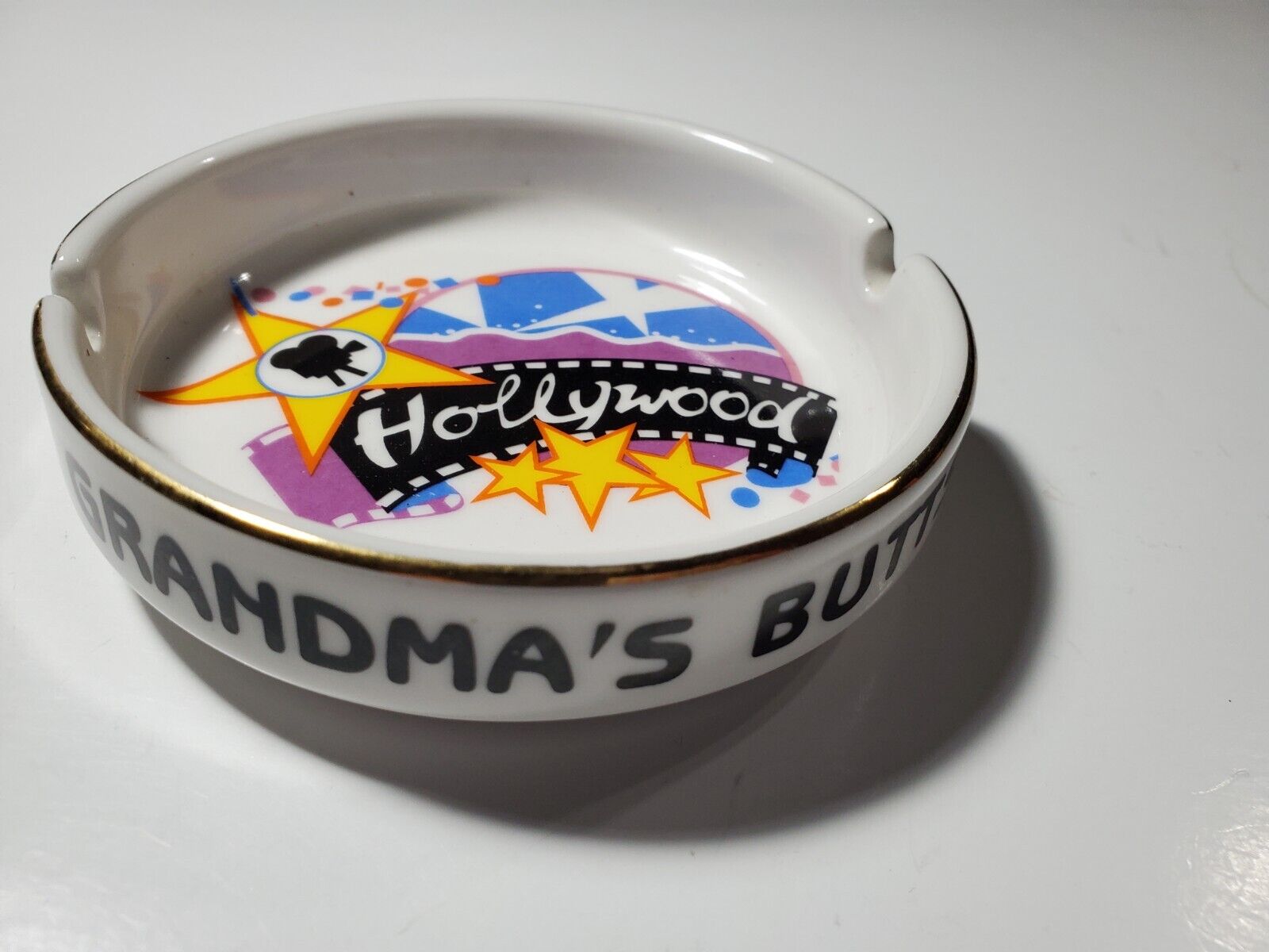 Vintage GRANDMAS BUTTS Ashtray Hollywood Ceramic Multicolor White Round 4.5\