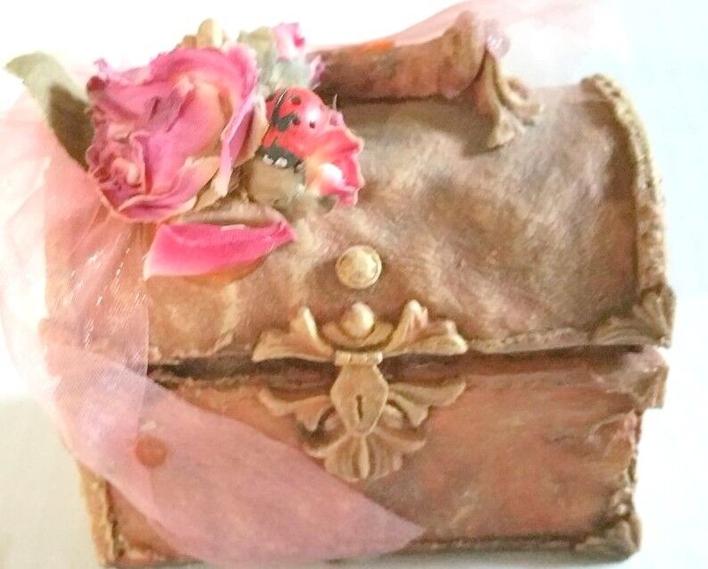 Pink Miniature Resin Trunk Topped with Pink Roses and Sheer Ribbon